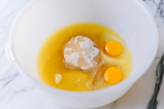 Sugar, butter, and eggs in mixing bowl, thewoksoflife.com