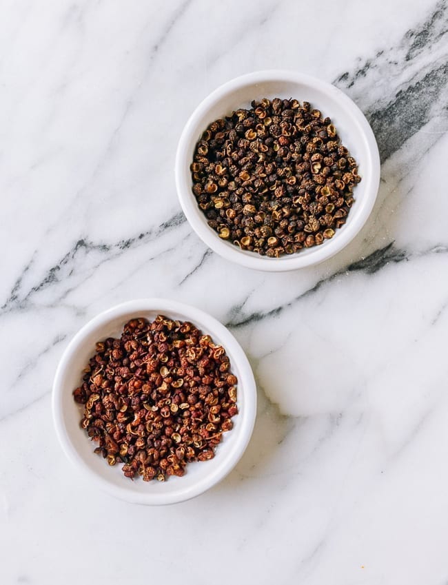 Red and Green Sichuan Peppercorns in small dishes, thewoksoflife.com