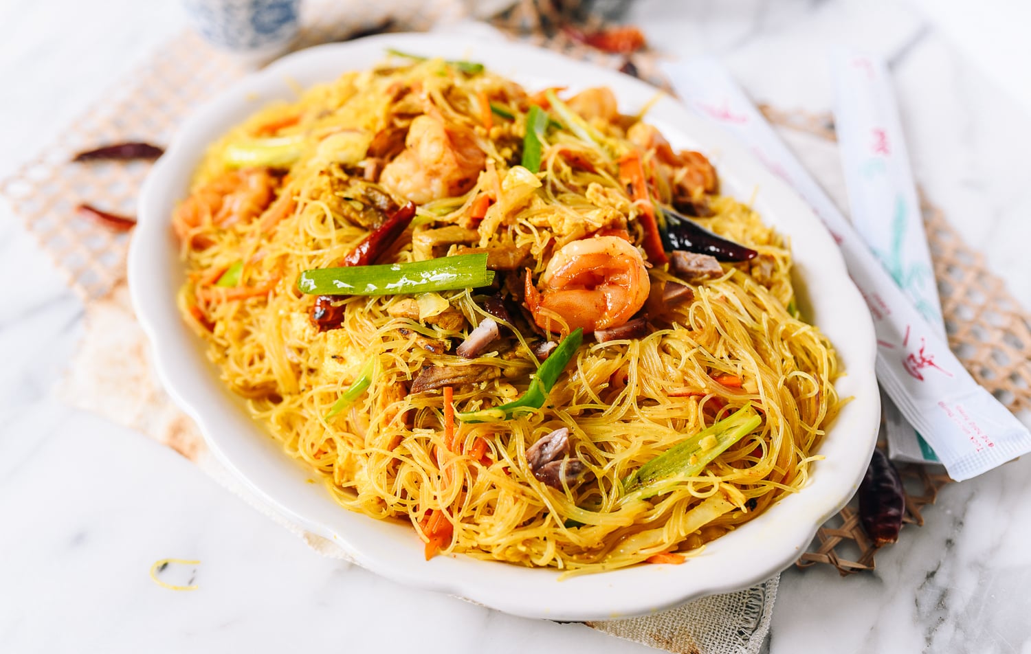 Singapore Mei Fun Rice Noodles on white plate, thewoksoflife.com