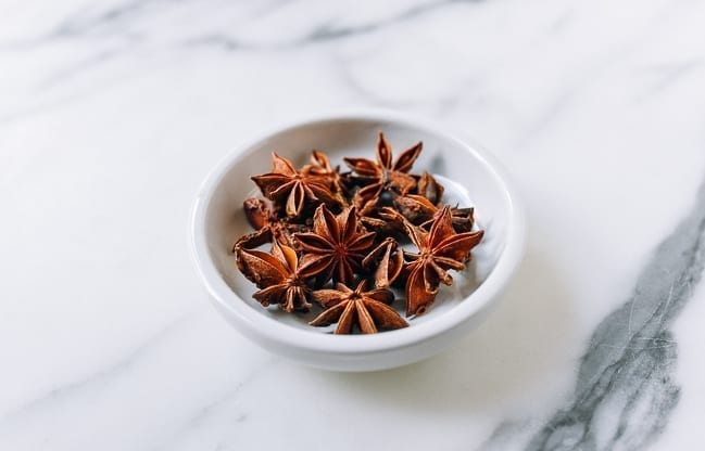 Star Anise pods in small white dish