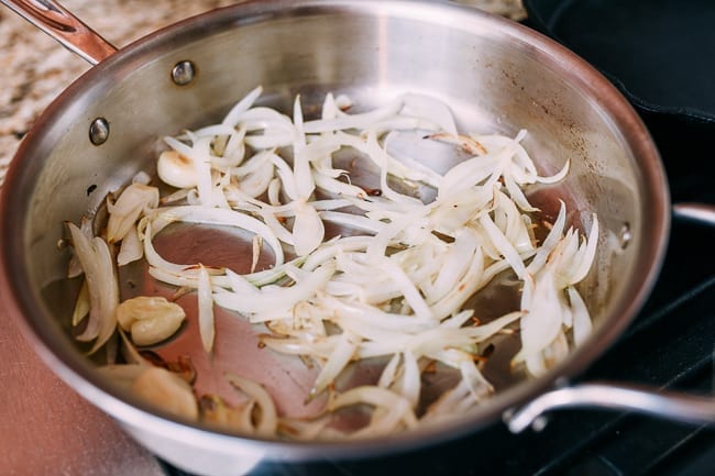 Cooking onions and garlic in skillet, thewoksoflife.com
