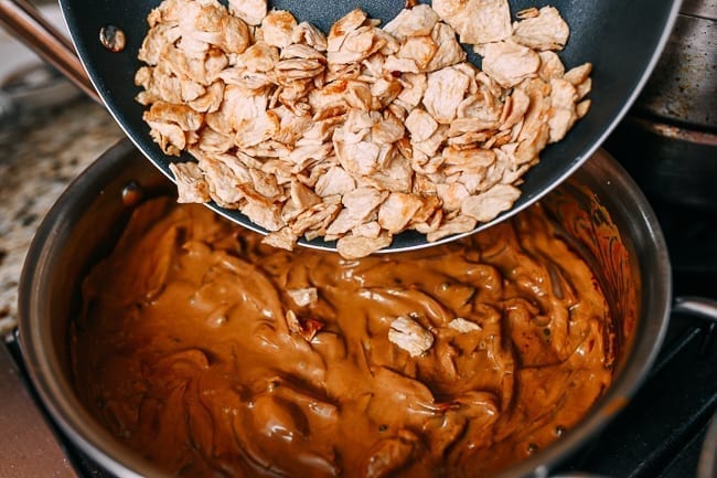 Adding seitan to adobo sauce, thewoksoflife.com