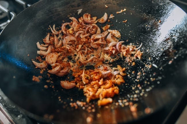 Adding zhacai to pad Thai mixture, thewoksoflife.com