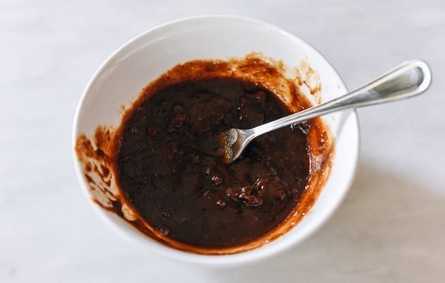 Tamarind pulp mixed with boiling water, thewoksoflife.com