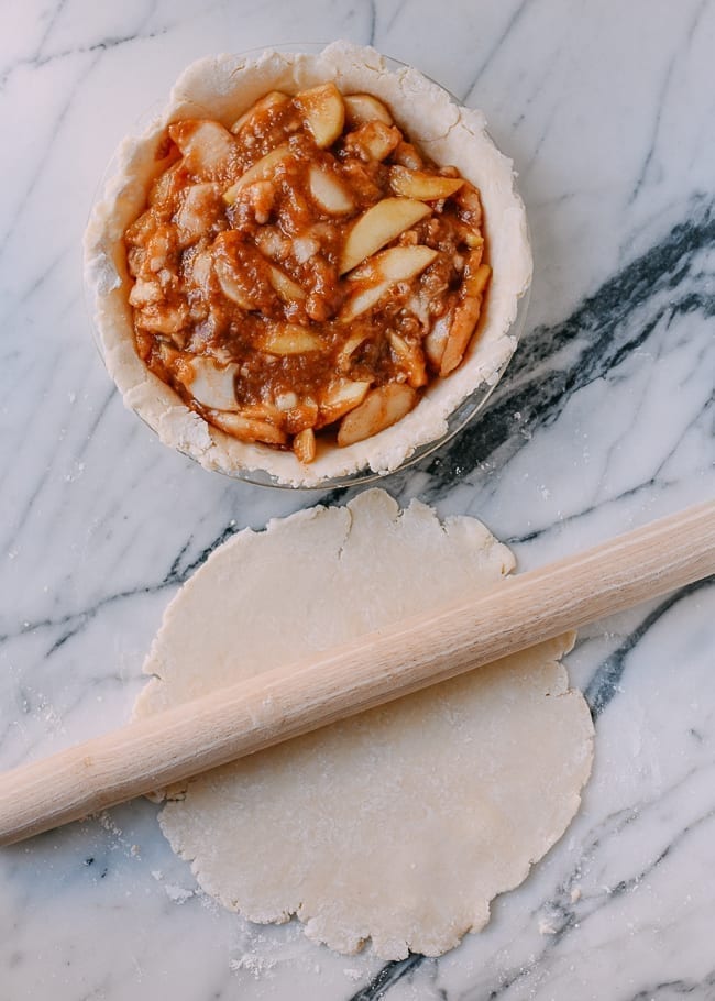Preparing apple pie to go into the oven, thewoksoflife.com