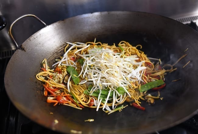 Adding bean sprouts to lo mein, thewoksoflife.com