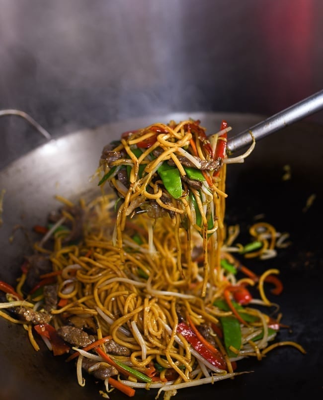 Lifting lo mein with wok spatula, thewoksoflife.com