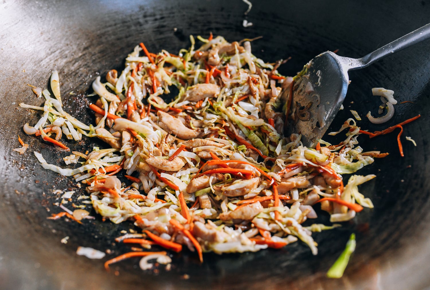 Chicken and vegetables in wok, thewoksoflife.com