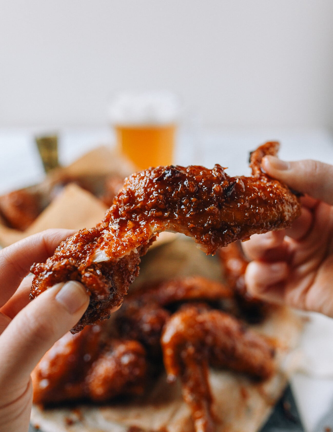 Pulling apart a Korean Soy Garlic Chicken Wing