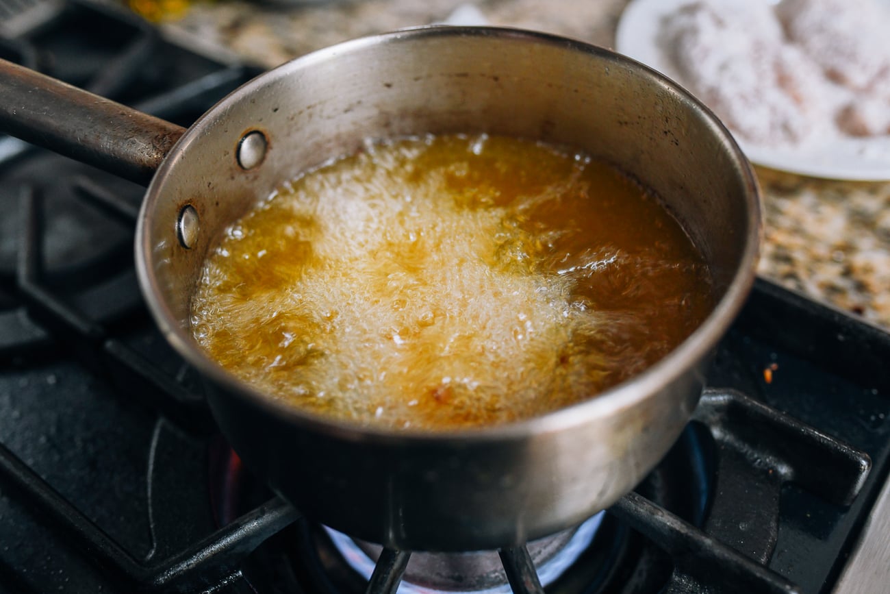 Frying chicken in oil