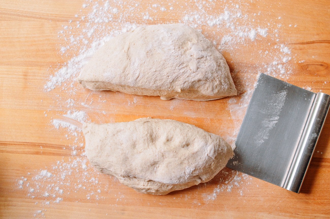 ball of dough cut in half