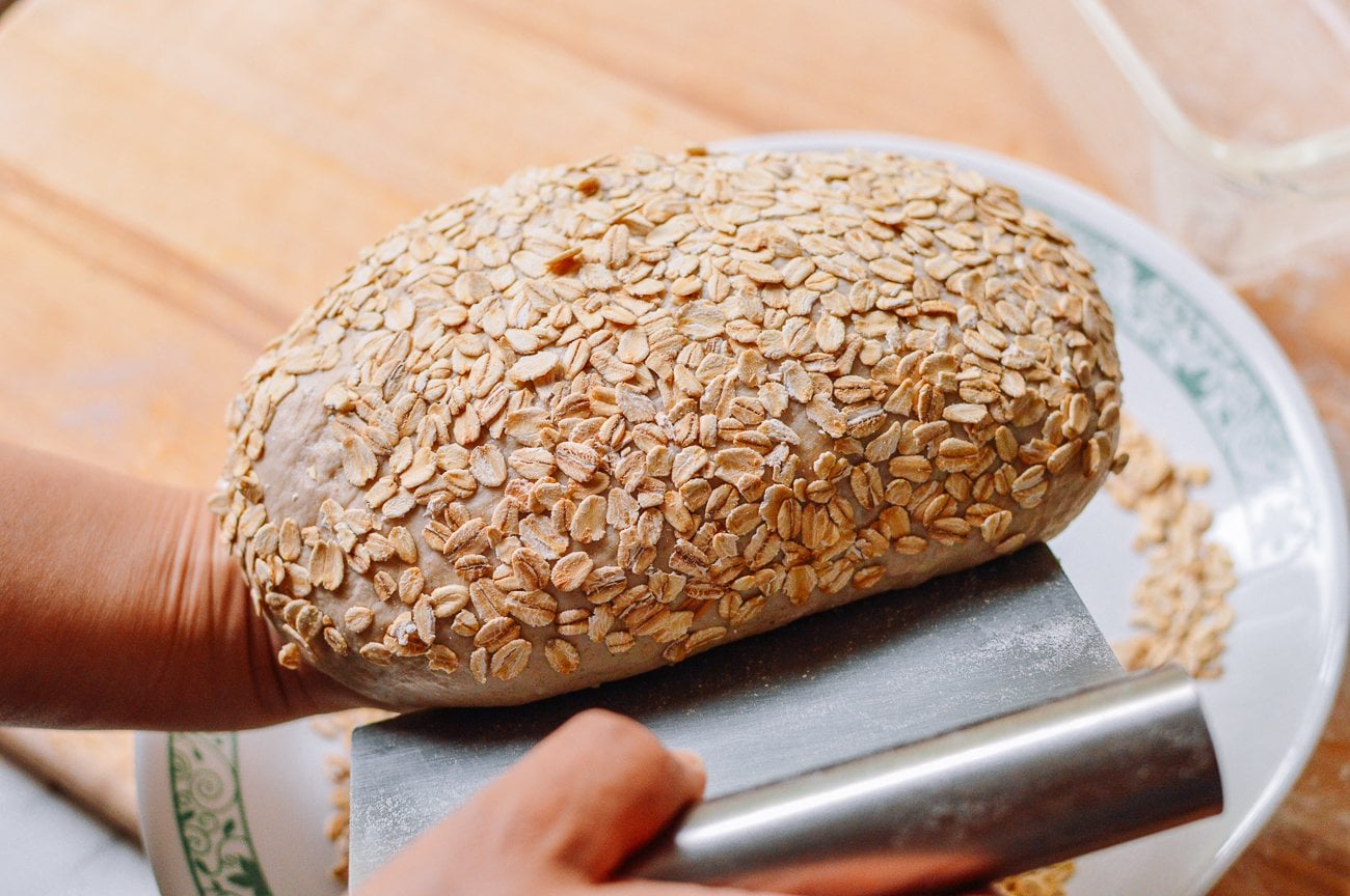 loaf of bread with oats on it
