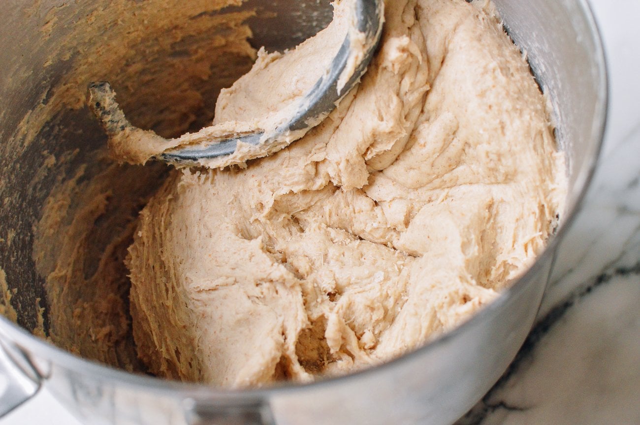 kneading multigrain bread dough with dough hook in stand mixer