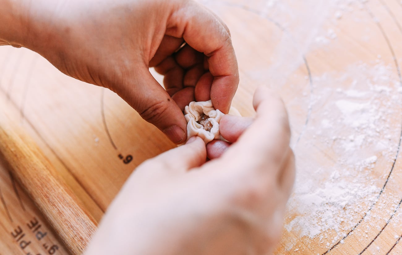 Sealing Chinese pork bun, thewoksoflife.com
