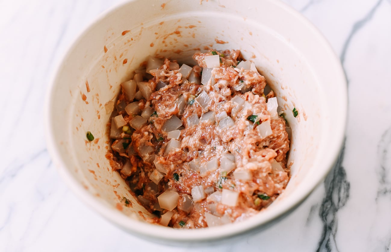 Shengjian mantou filling with aspic mixed in, thewoksoflife.com