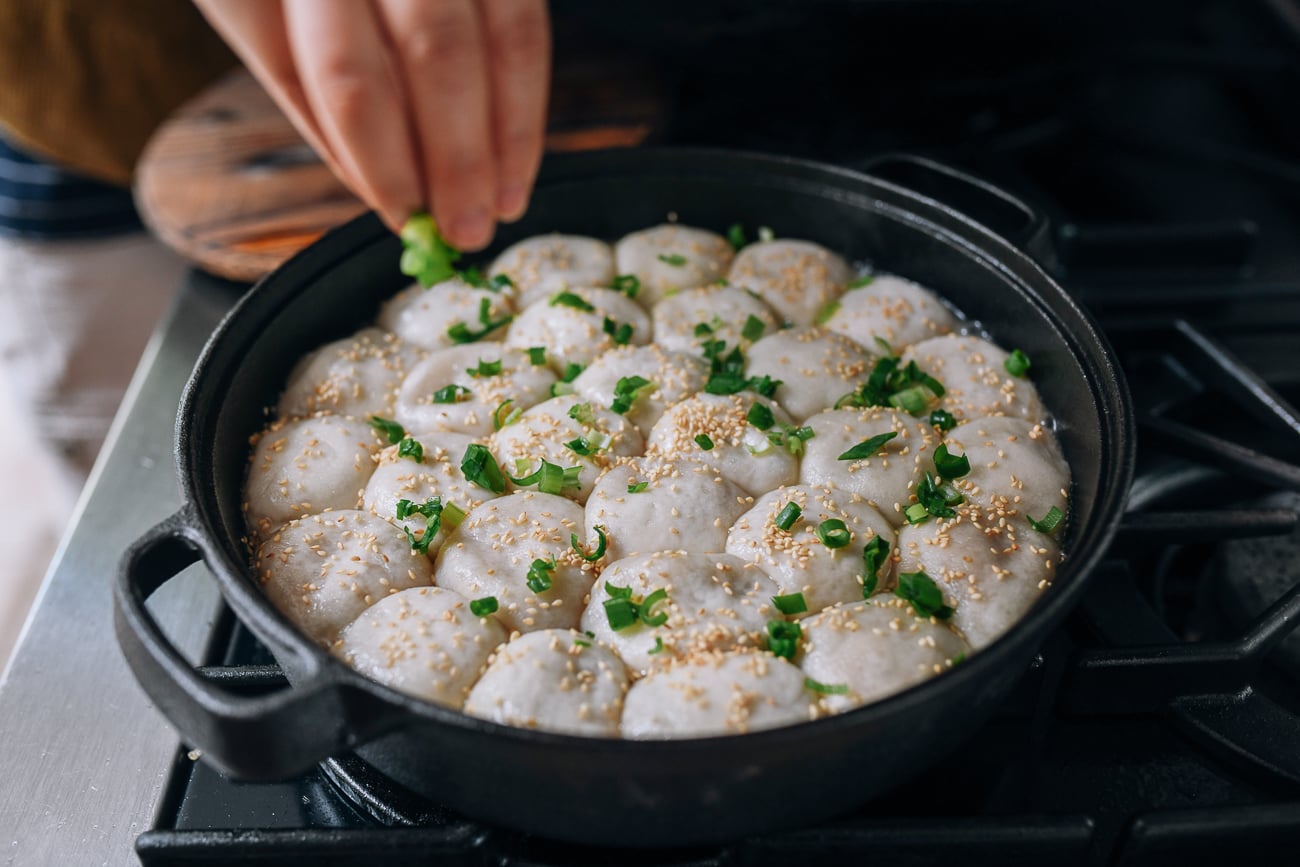 Sprinkling buns with scallions, thewoksoflife.com