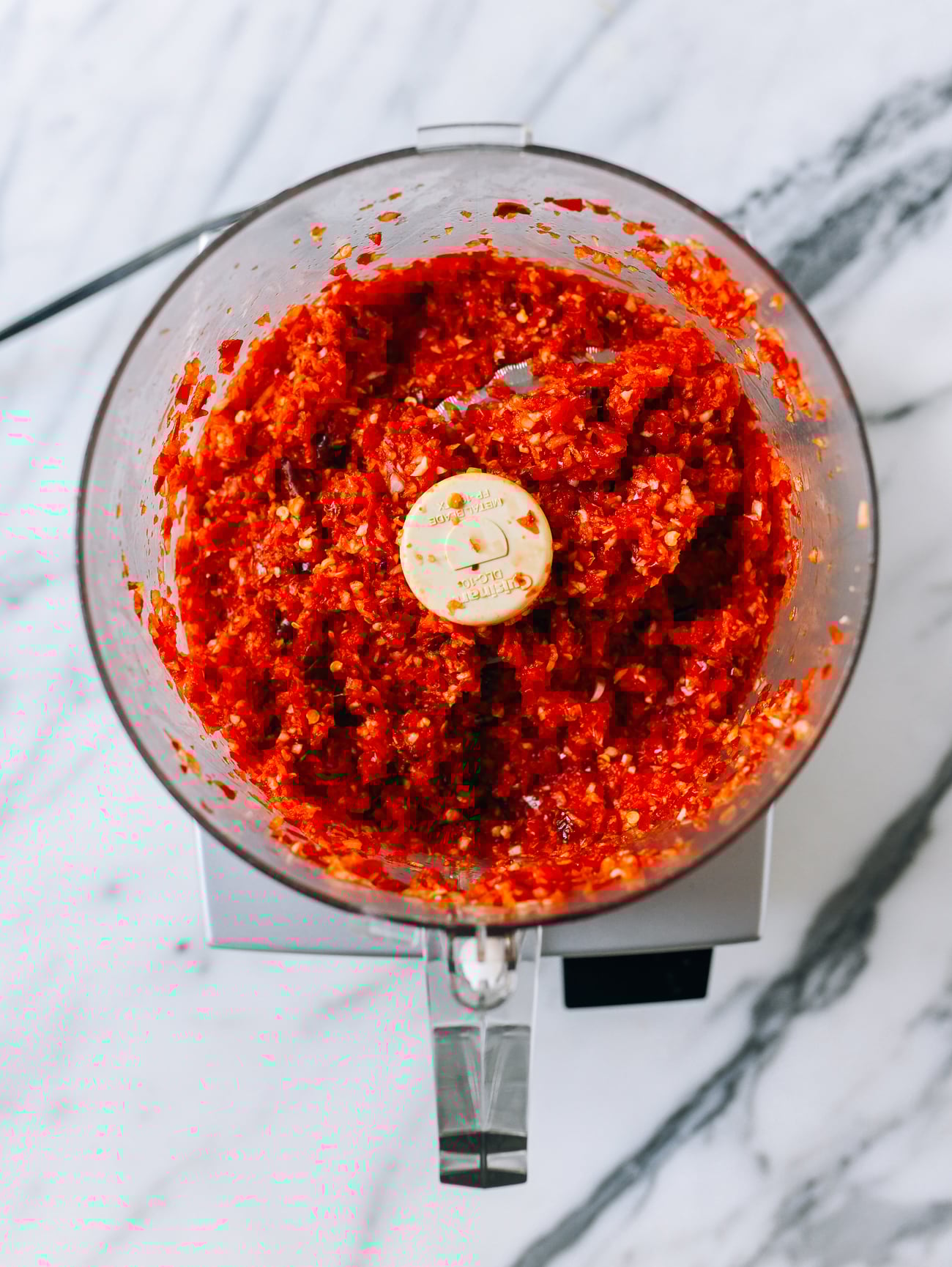 Paste of chili, shallots, and garlic in food processor