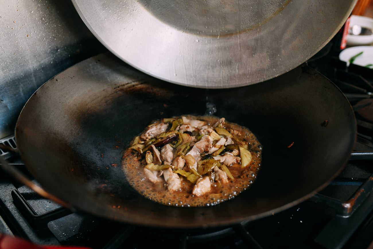 Removing the cover from ham choy chicken