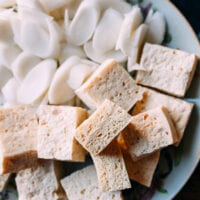 Frozen tofu with rice cakes on plate for hot pot