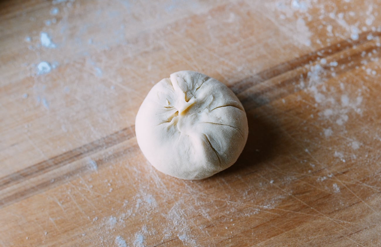 Pinching dough closed