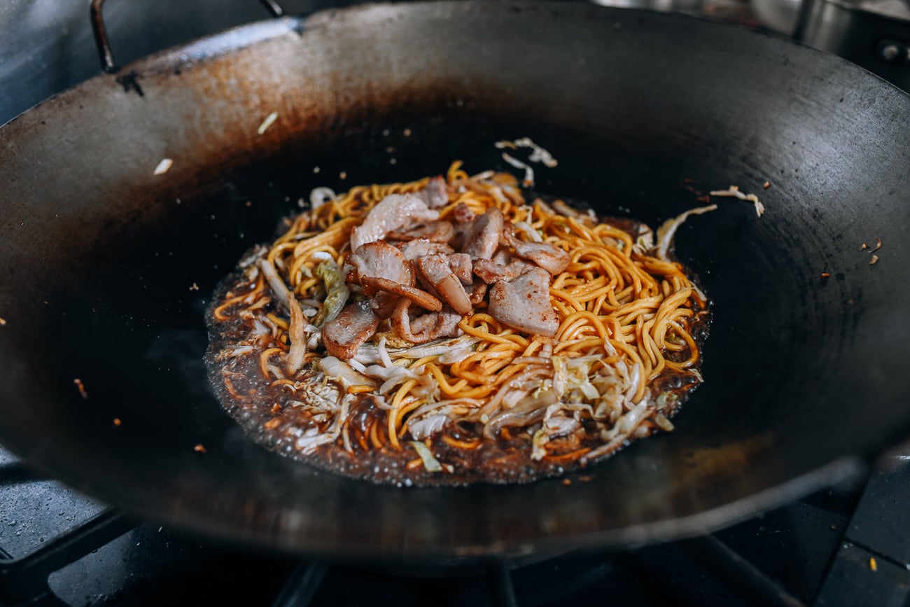 Adding pork belly back to wok