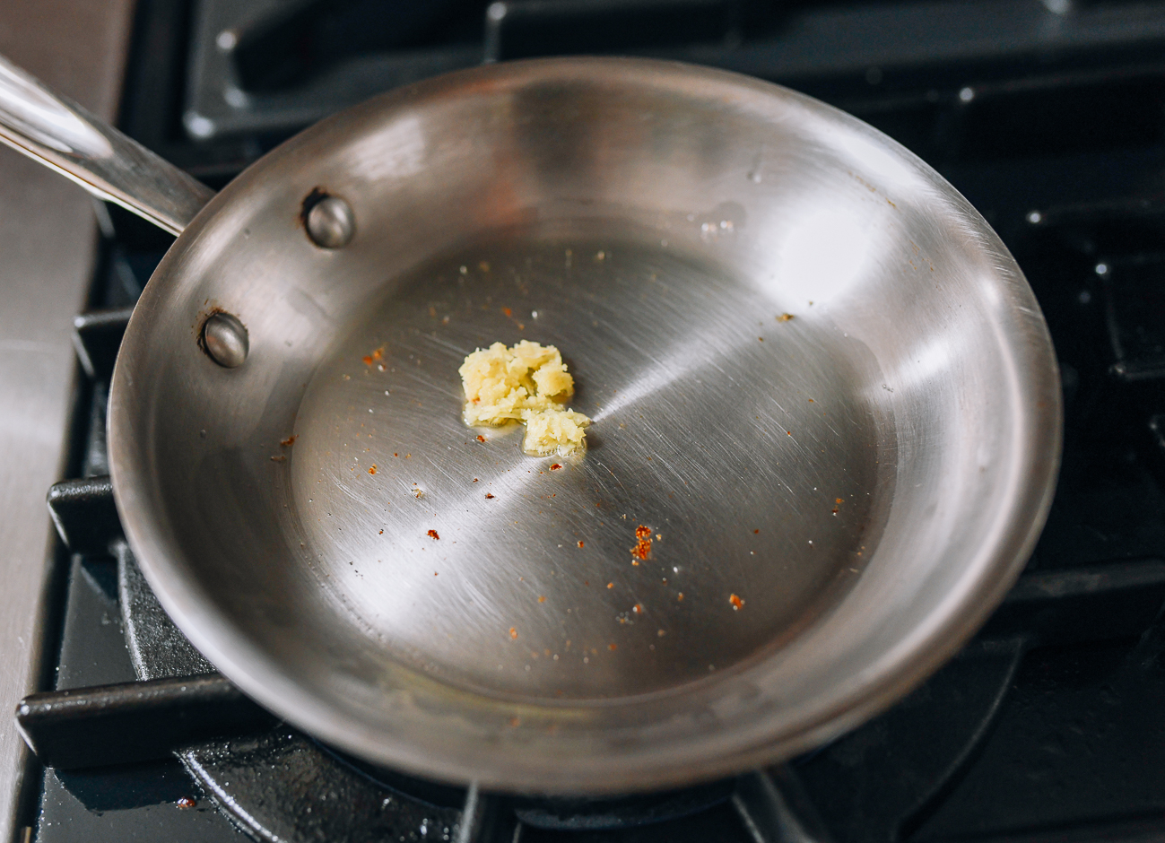 Frying ginger in pan