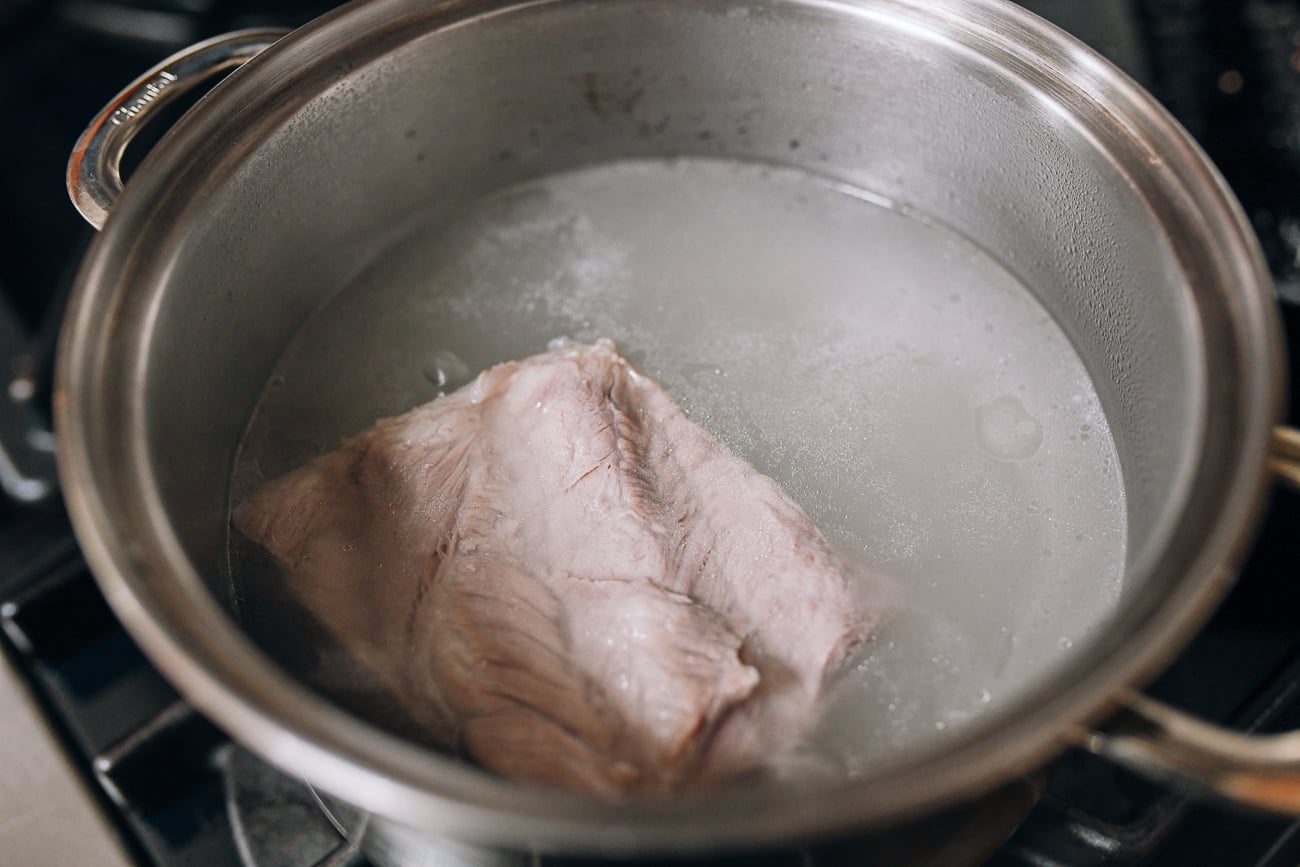 Blanching pork belly