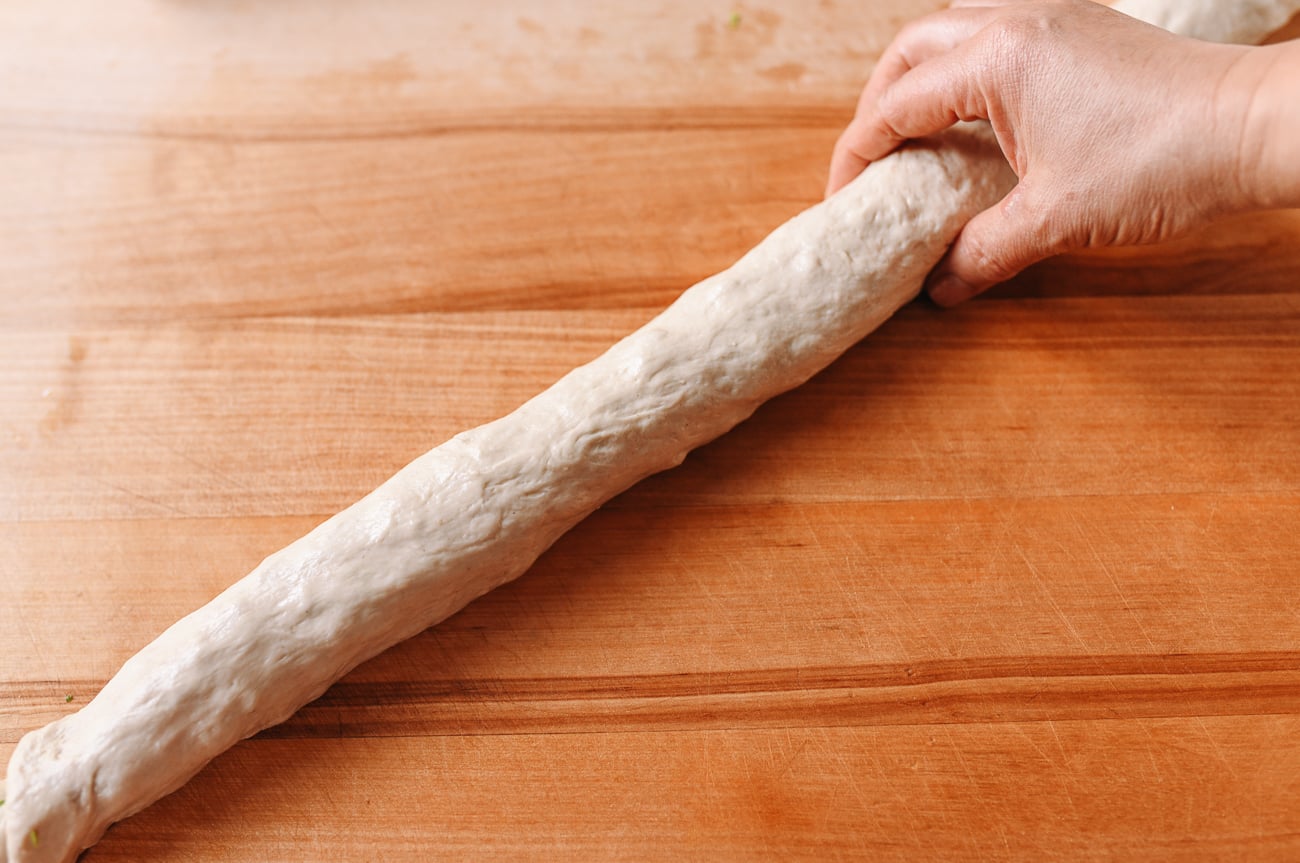 Stretching the log into a thinner tube