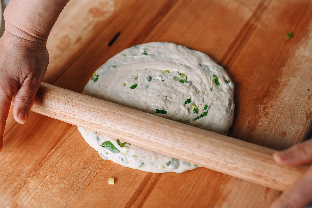 Rolling dough into a circle