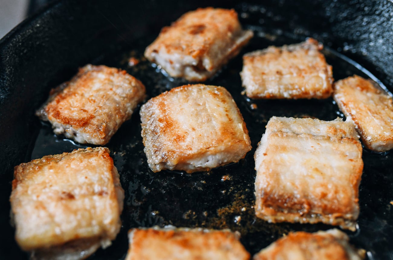Belt fish frying in oil