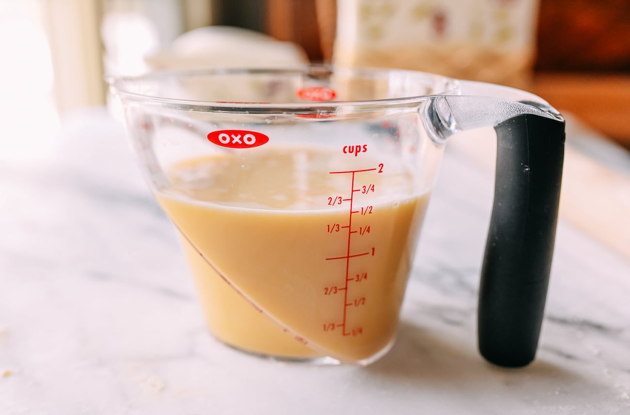 Custard filling in measuring cup