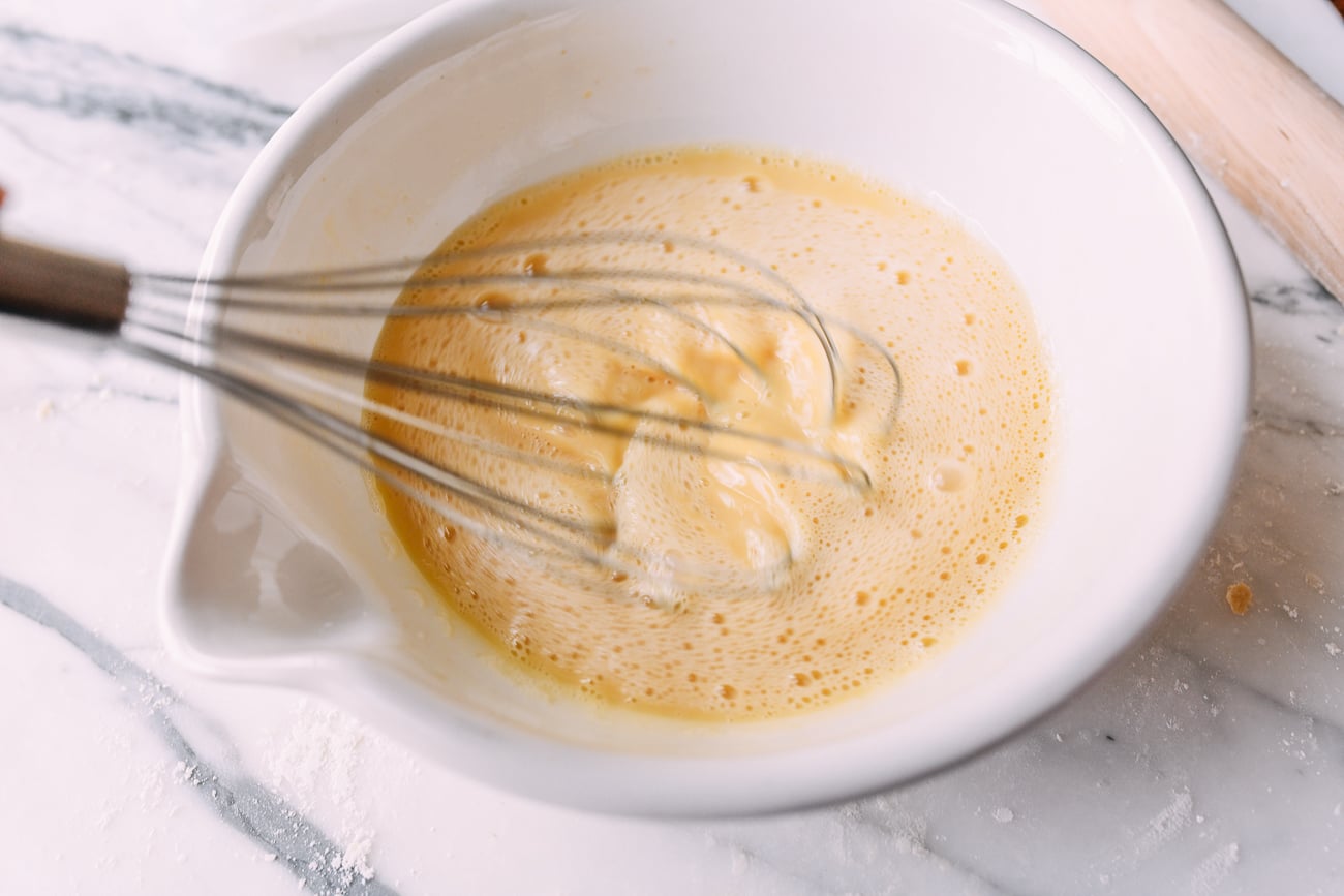 Whisking egg custard filling together