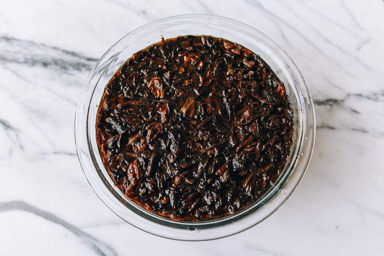 Soaking Meigan Cai in bowl of water