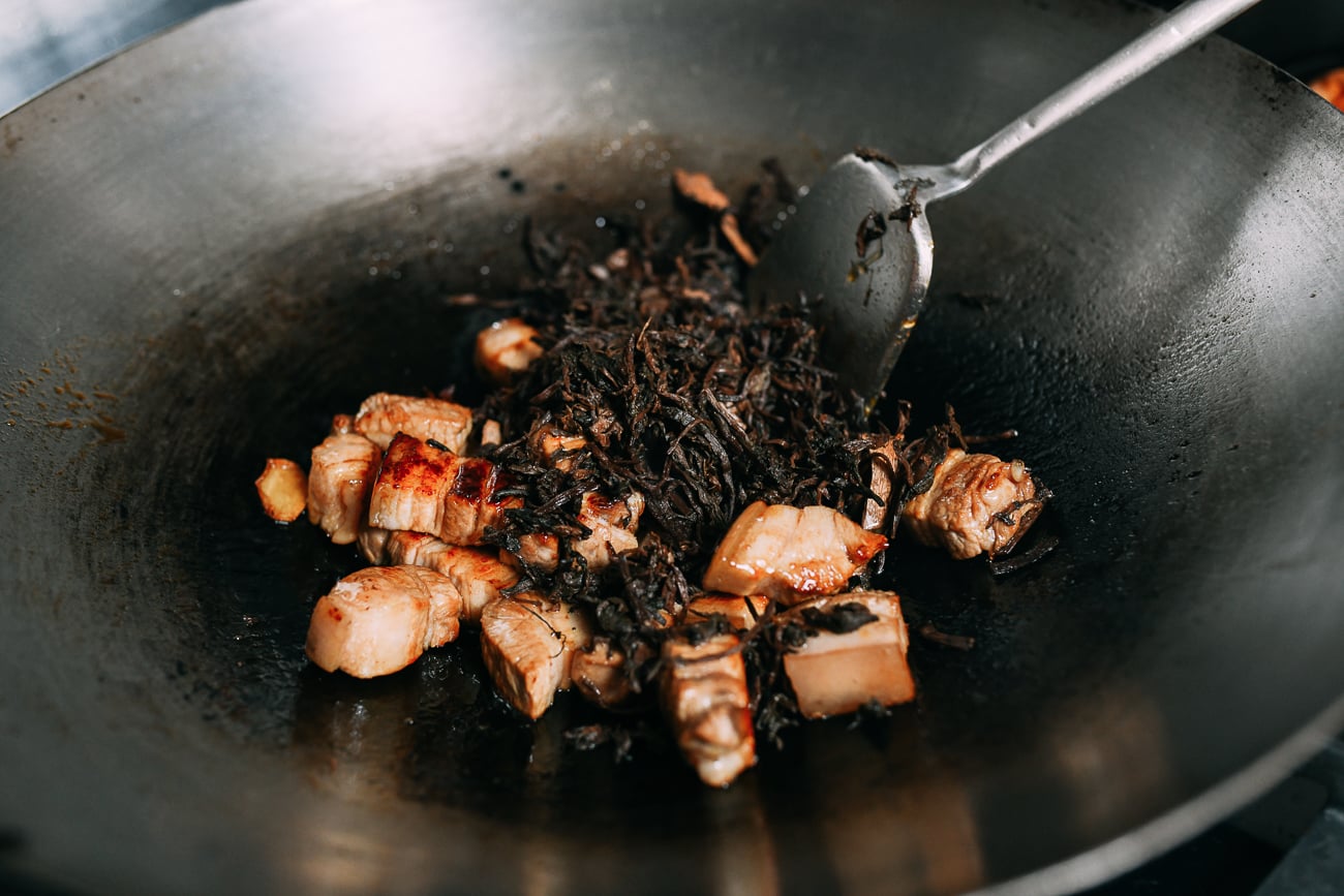 Adding Mei Gan Cai to pork belly