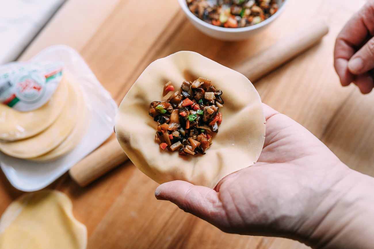 Vegetable filling in middle of dumpling wrapper