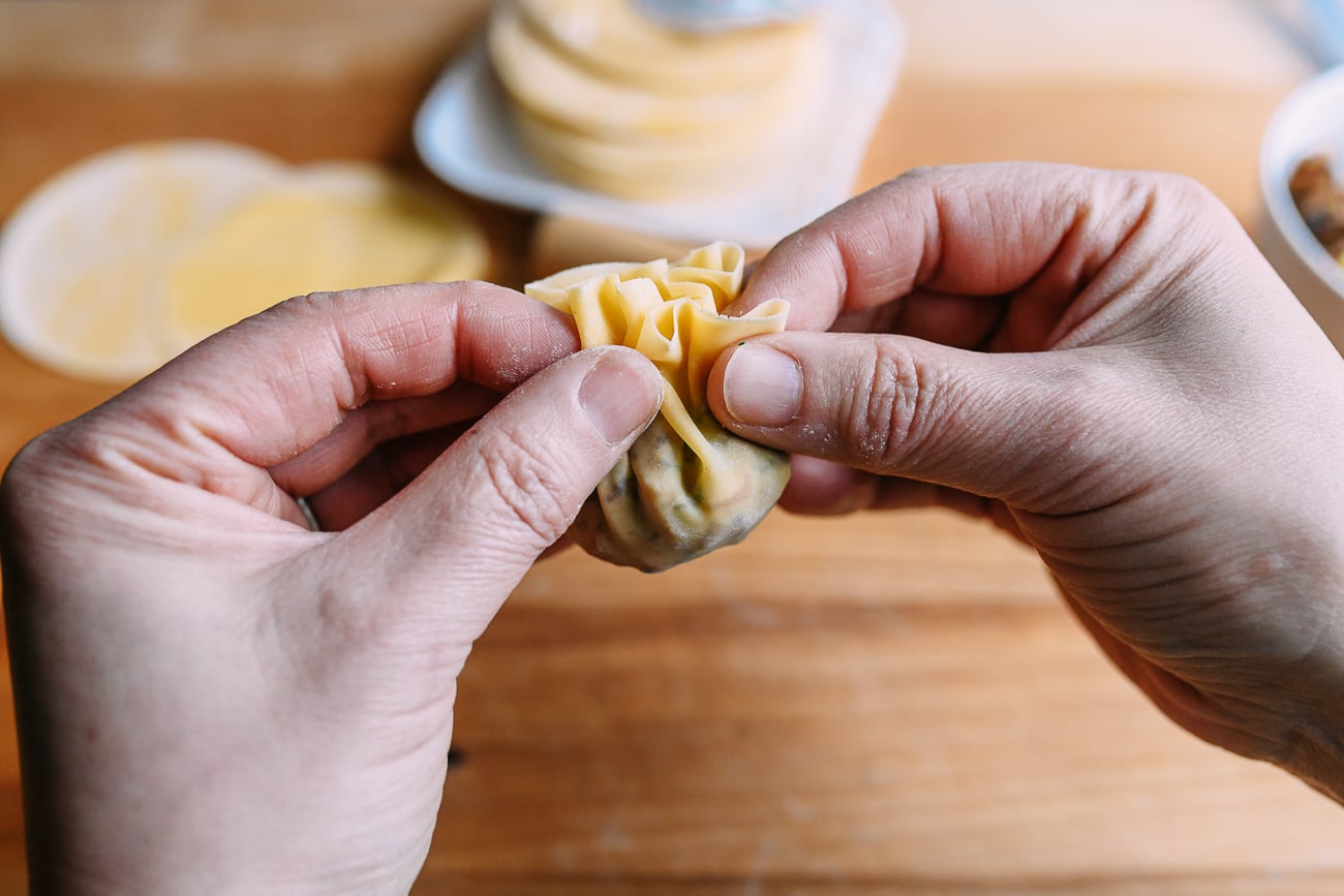 Squeezing wrapper around filling