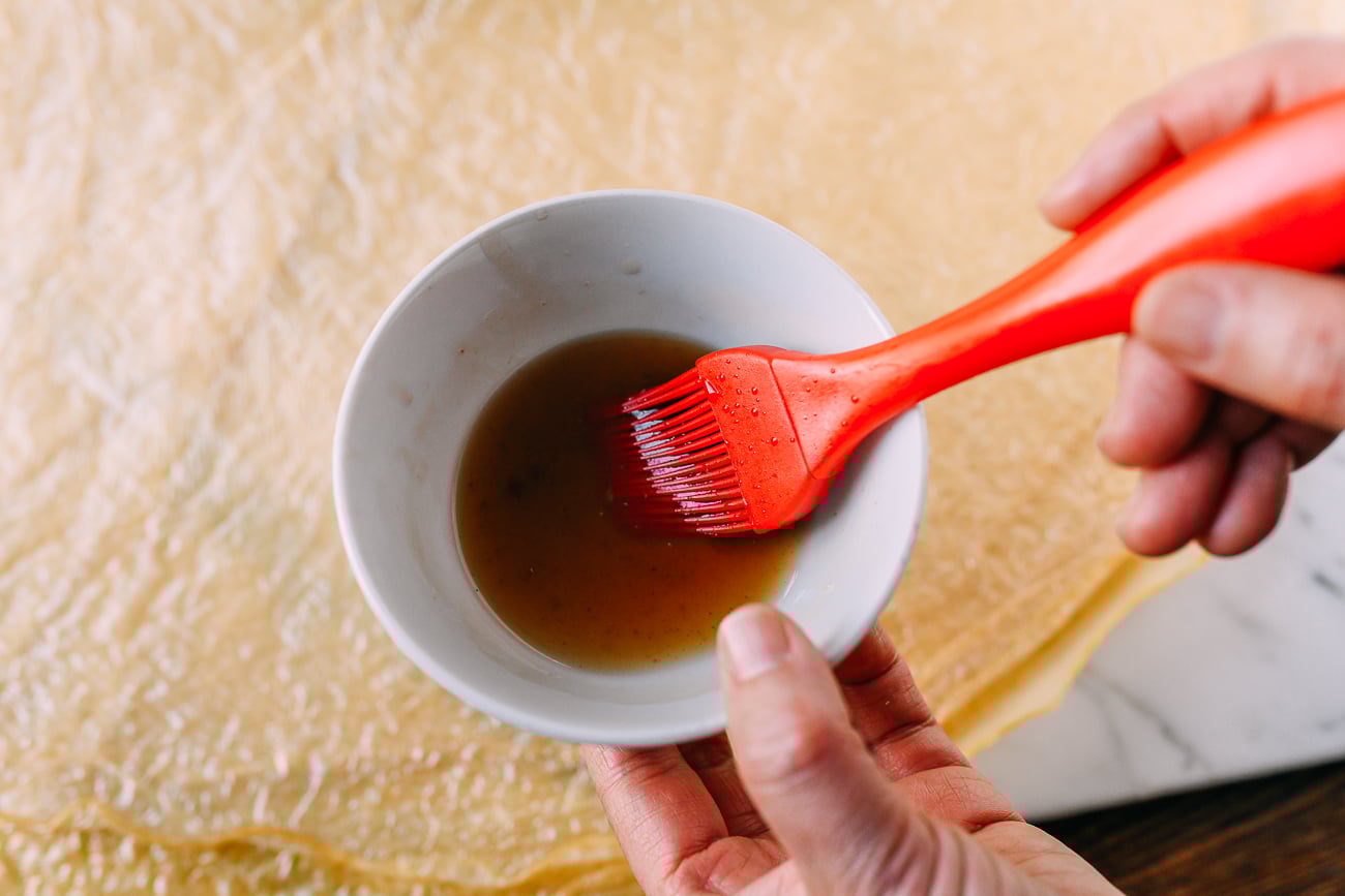 Oyster sauce and water mixture for brushing onto bean curd sheets