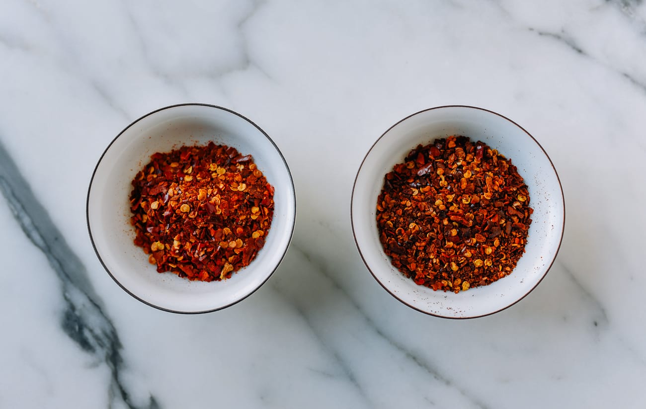 Chili flakes before and after wok roasting
