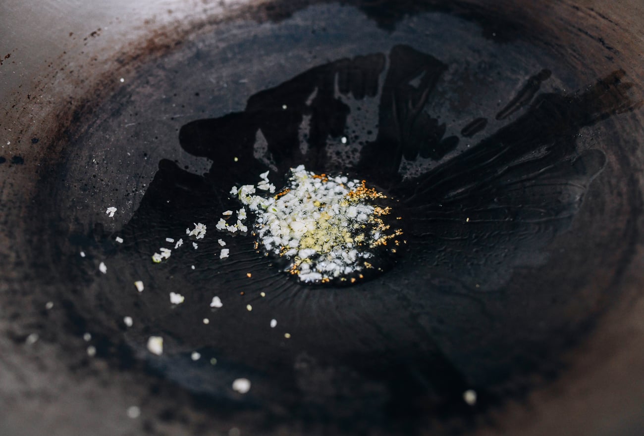 Ginger and garlic in oil in wok