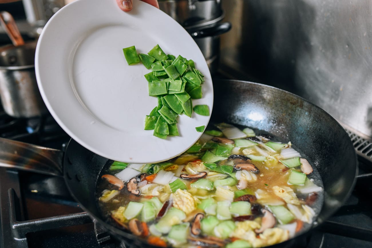 Adding snow peas to soup