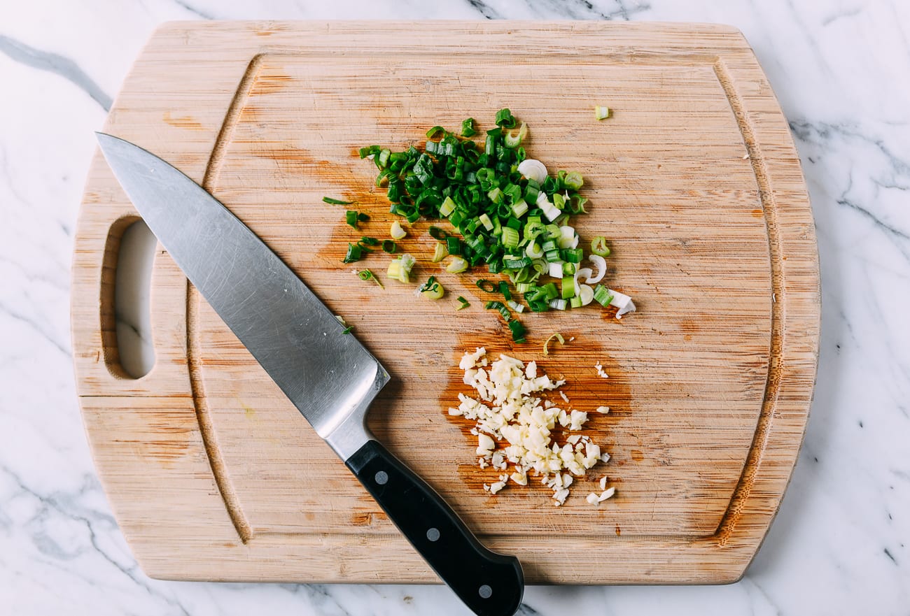 Finely chopped scallion and garlic