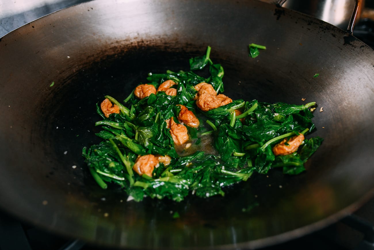 Pea tips and seitan puffs in wok