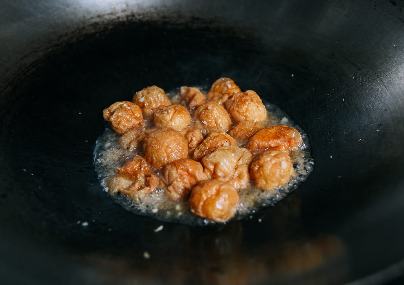 Half deflated seitan puffs simmering