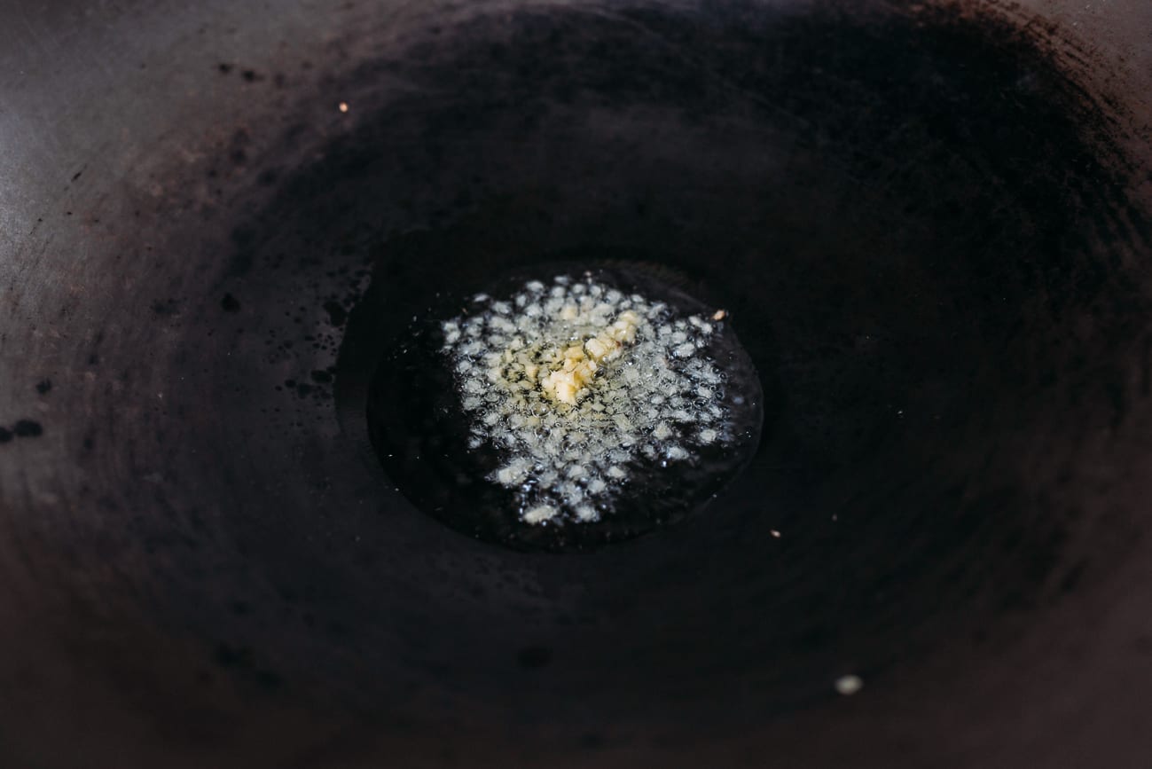 Cooking ginger in wok