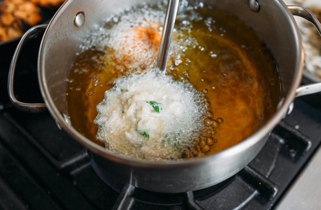 Lowering you dunzi into oil