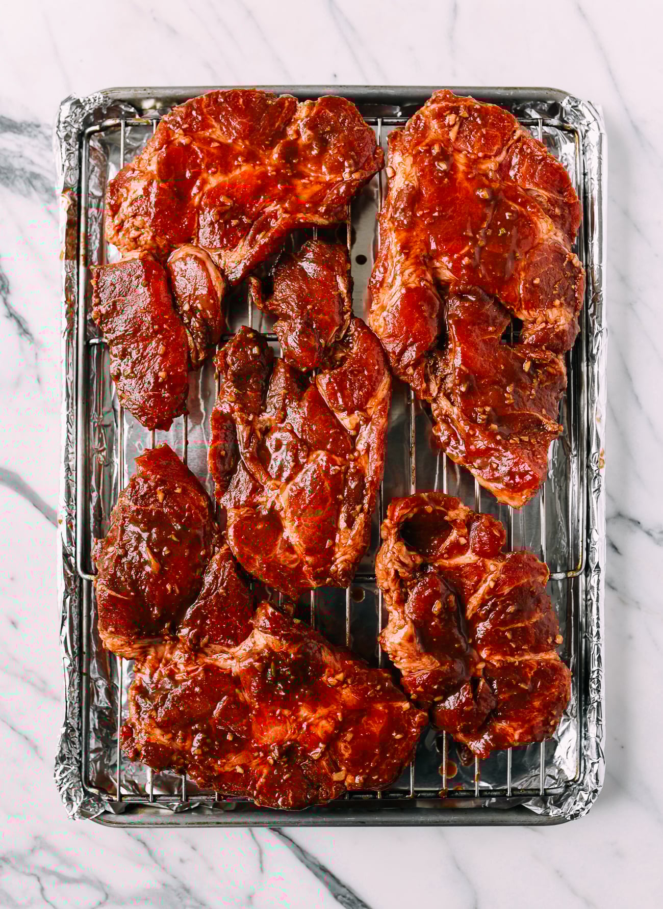 Pork pieces on roasting pan