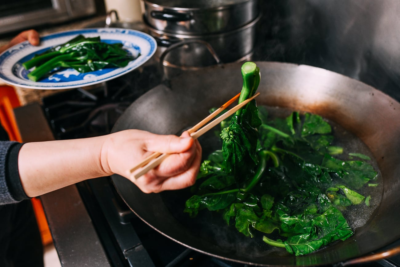 Removing Chinese Broccoli from water