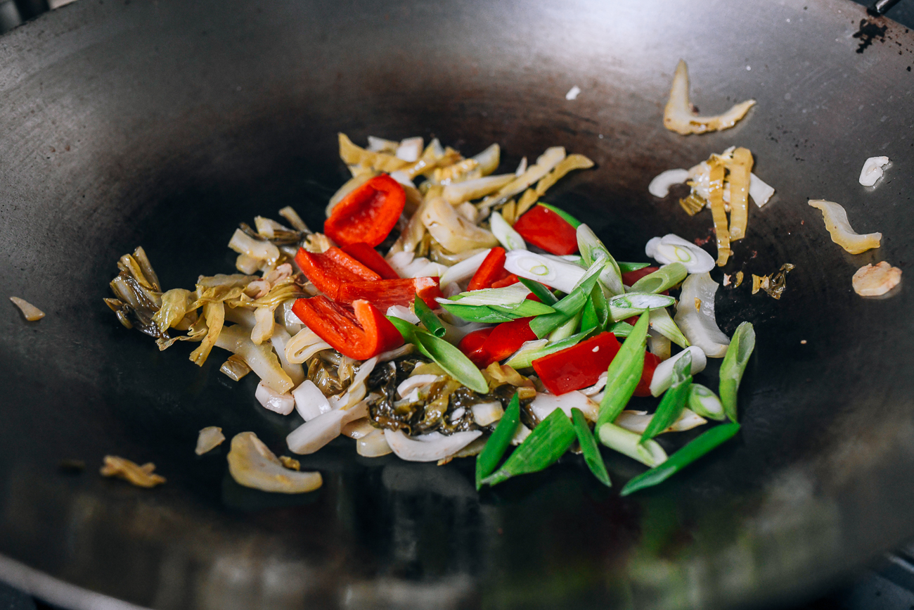 Adding the scallions and bell peppers