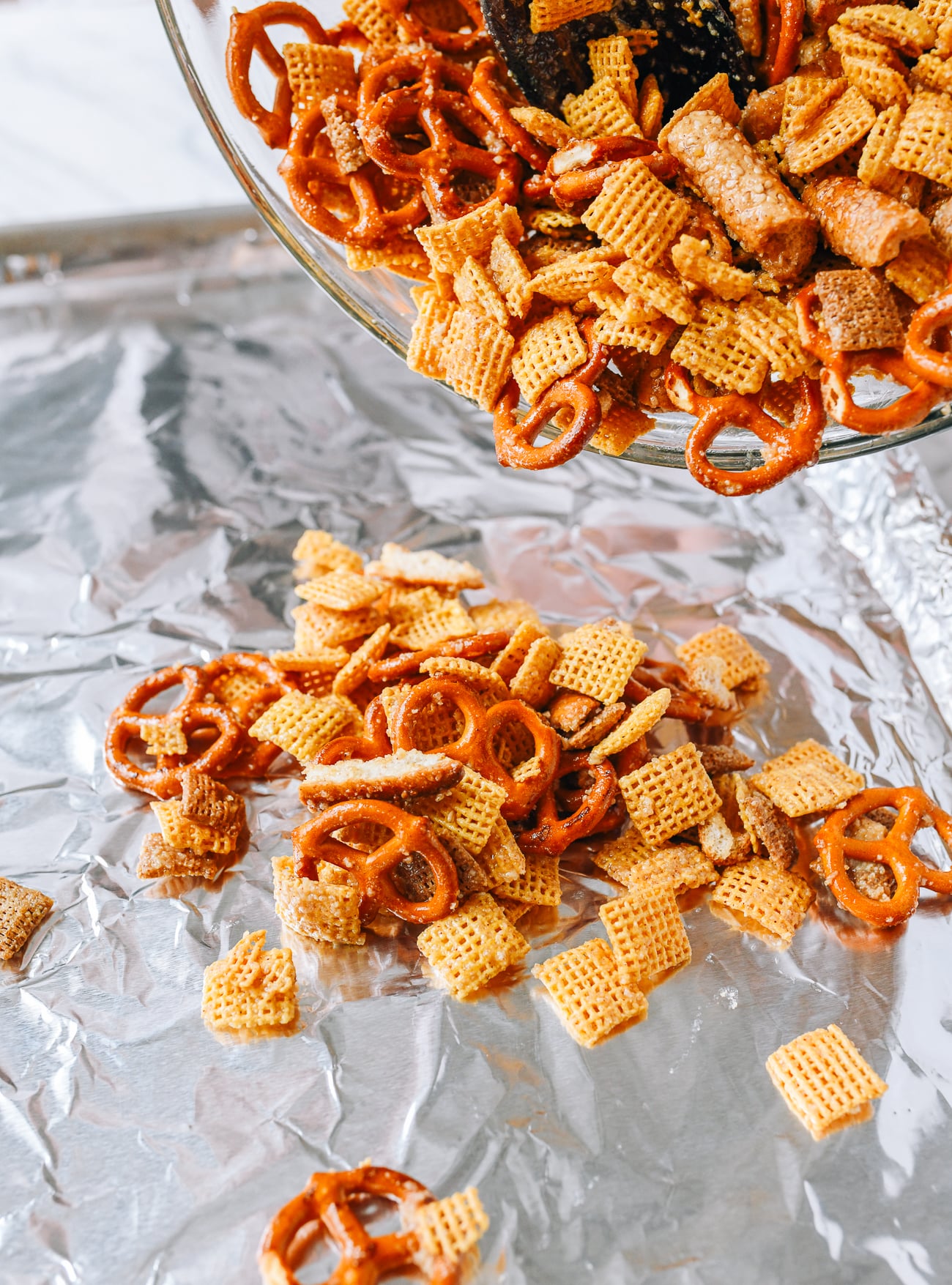 Transferring homemade chex mix to baking sheet