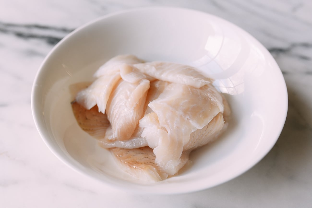 Fish filet pieces in medium bowl